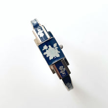 Load image into Gallery viewer, Vintage André Mouche Quartz Watch with Navy Enamel Floral Design, Concealed Dial and Stainless Steel Bangle Bracelet