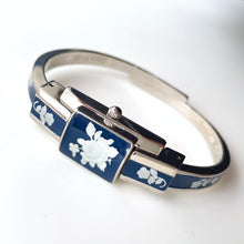 Load image into Gallery viewer, Vintage André Mouche Quartz Watch with Navy Enamel Floral Design, Concealed Dial and Stainless Steel Bangle Bracelet