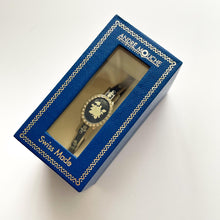 Load image into Gallery viewer, Vintage André Mouche Quartz Watch with Navy Enamel Floral Design, Concealed Dial and Silver-Tone Bangle Bracelet
