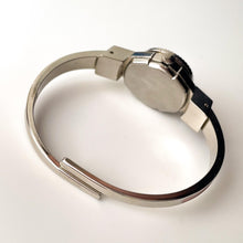 Load image into Gallery viewer, Vintage 1990s André Mouche Quartz Watch with Pink & Burgundy Enamel Floral Design, Concealed Dial and Silver-Tone Bangle Bracelet