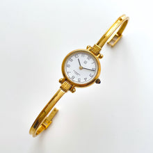 Load image into Gallery viewer, Vintage 1990s Gold-Plated Ladies' Givenchy Bangle Quartz Watch with Round Dial
