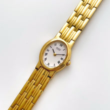Load image into Gallery viewer, Vintage 1990s Gold-Plated Ladies' Seiko Quartz Watch with White Oval Dial and Roman Numerals