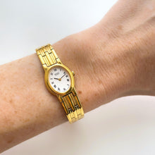 Load image into Gallery viewer, Vintage 1990s Gold-Plated Ladies' Seiko Quartz Watch with White Oval Dial and Roman Numerals