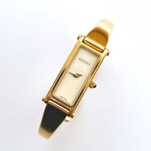 Load image into Gallery viewer, Vintage Ladies' Gold-Plated Gucci 1500L Bangle Quartz Watch with Beige Rectangular Dial