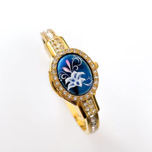 Load image into Gallery viewer, Vintage André Mouche Quartz Watch with Blue Enamel Floral Design, Concealed Dial and Gold-Plated Crystal-Set Bangle Bracelet