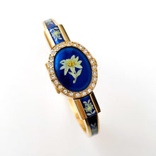 Load image into Gallery viewer, Vintage R. Müller Quartz Watch with Blue Enamel Floral Design, Concealed Dial and Gold-Plated Bangle Bracelet