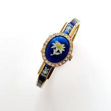 Load image into Gallery viewer, Vintage R. Müller Quartz Watch with Blue Enamel Floral Design, Concealed Dial and Gold-Plated Bangle Bracelet