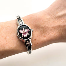 Load image into Gallery viewer, Vintage André Mouche Quartz Watch with Black & Purple Enamel Floral Design, Concealed Dial and Silver-Tone Bangle Bracelet