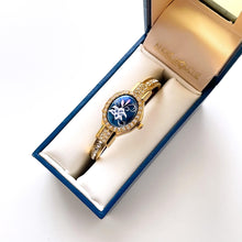 Load image into Gallery viewer, Vintage André Mouche Quartz Watch with Blue Enamel Floral Design, Concealed Dial and Gold-Plated Crystal-Set Bangle Bracelet