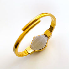 Load image into Gallery viewer, Vintage André Mouche Quartz Watch - Burgundy Floral Design, Concealed Dial, Gold-Plated