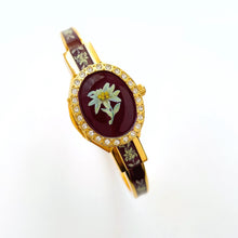 Load image into Gallery viewer, Vintage André Mouche Quartz Watch with Burgundy Enamel Floral Design, Concealead Dial and Gold-Plated Bangle Bracelet