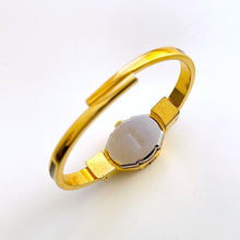 Load image into Gallery viewer, Vintage André Mouche Quartz Watch with Black and Green Enamel Floral Design, Concealed Dial and Gold-Plated Bangle Bracelet