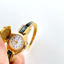 Load image into Gallery viewer, Vintage Quartz Watch with Black and Green Enamel Floral Design, Concealed Dial and Gold-Plated Bangle Bracelet