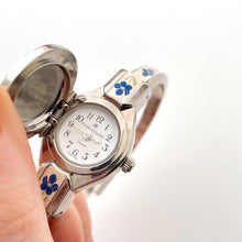 Load image into Gallery viewer, Vintage André Mouche Quartz Watch with Blue Enamel Floral Design, Concealed Dial and Silver-Tone Bangle Bracelet