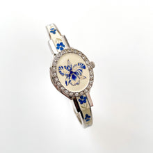 Load image into Gallery viewer, Vintage André Mouche Quartz Watch with Blue Enamel Floral Design, Concealed Dial and Silver-Tone Bangle Bracelet