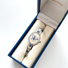 Load image into Gallery viewer, Vintage André Mouche Quartz Watch with Blue Enamel Floral Design, Concealed Dial and Silver-Tone Bangle Bracelet