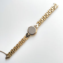 Load image into Gallery viewer, Rare 90s Gold-Plated Seiko Tissé Quartz Watch with Round Dial and Thin Bracelet