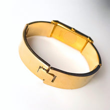 Load image into Gallery viewer, Vintage 90s Yves Saint Laurent Ladies' Quartz Watch with Gold-Plated Bangle Bracelet and Cream Dial