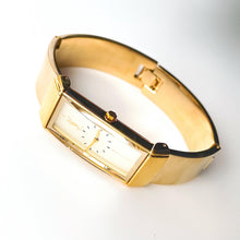 Load image into Gallery viewer, Vintage 90s Yves Saint Laurent Ladies' Quartz Watch with Gold-Plated Bangle Bracelet and Cream Dial