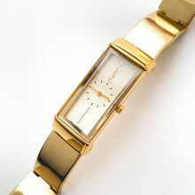 Load image into Gallery viewer, Vintage 90s Yves Saint Laurent Ladies' Quartz Watch with Gold-Plated Bangle Bracelet and Cream Dial