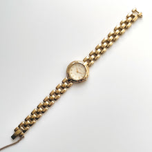 Load image into Gallery viewer, Rare 90s Gold-Plated Seiko Tissé Quartz Watch with Round Dial and Thin Bracelet