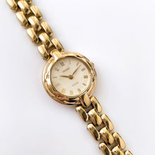 Load image into Gallery viewer, Rare 90s Gold-Plated Seiko Tissé Quartz Watch with Round Dial and Thin Bracelet