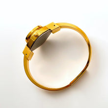 Load image into Gallery viewer, Vintage 00s André Mouche Quartz Watch with Beige and Blue Enamel Floral Design, Concealed Dial and Gold-Plated Bangle Bracelet - Boxed