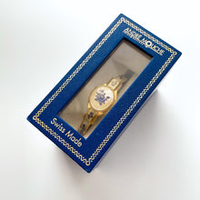 Load image into Gallery viewer, Vintage 00s André Mouche Quartz Watch with Beige and Blue Enamel Floral Design, Concealed Dial and Gold-Plated Bangle Bracelet - Boxed