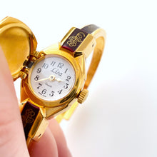 Load image into Gallery viewer, Vintage André Mouche Quartz Watch with Burgundy Enamel Floral Design, Concealead Dial and Gold-Plated Bangle Bracelet