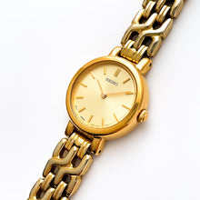 Load image into Gallery viewer, Vintage 1990s Gold-Plated Ladies' Seiko Quartz Watch with Round Dial and Intricate Bracelet