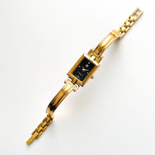 Load image into Gallery viewer, Givenchy Millésime – Gold-Plated Quartz Bangle Watch with Black Dial, 1990s