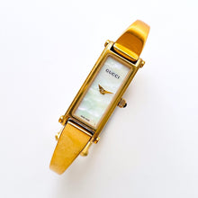 Load image into Gallery viewer, Vintage 1990s Ladies' Gold-Plated Gucci 1500L Bangle Quartz Watch with Rectangular Mother of Pearl Dial - Boxed