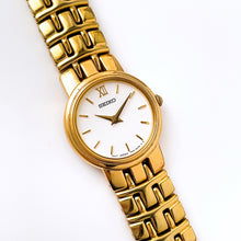Load image into Gallery viewer, Vintage 1990s Gold-Plated Ladies' Seiko Quartz Watch with Round White Dial
