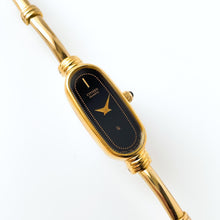 Load image into Gallery viewer, Vintage 1990s Gold-Plated Ladies' Citizen Quartz Watch With Articulated Bangle Bracelet