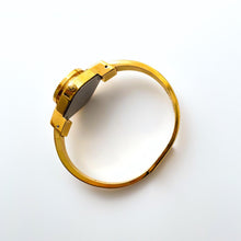 Load image into Gallery viewer, Andre Mouche Quartz Watch - Red Enamel, Concealed Dial, Gold Bangle