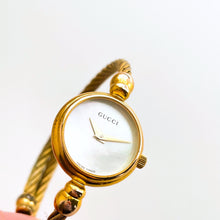 Load image into Gallery viewer, Vintage Ladies' Gold-Tone Gucci 2700.2.L Bangle Quartz Watch with Mother of Pearl Dial