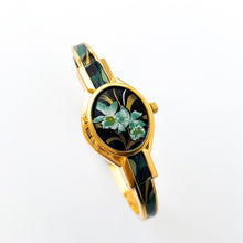 Load image into Gallery viewer, Vintage André Mouche Quartz Watch with Black & Green Enamel Floral Design, Concealed Dial and Gold-Plated Bangle Bracelet - Boxed