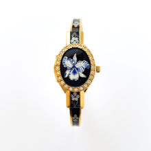 Load image into Gallery viewer, Vintage André Mouche Quartz Watch with Black & Blue Enamel Floral Design, Crystal-Set Bezel, Concealed Dial and Gold-Plated Bracelet - Boxed