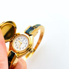 Load image into Gallery viewer, Vintage André Mouche Quartz Watch with Black & Green Enamel Floral Design, Concealed Dial and Gold-Plated Bangle Bracelet - Boxed