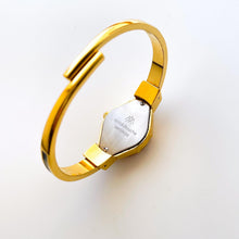 Load image into Gallery viewer, Vintage André Mouche Quartz Watch with Black & Green Enamel Floral Design, Concealed Dial and Gold-Plated Bangle Bracelet - Boxed