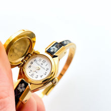 Load image into Gallery viewer, Vintage André Mouche Quartz Watch with Black & Blue Enamel Floral Design, Crystal-Set Bezel, Concealed Dial and Gold-Plated Bracelet - Boxed