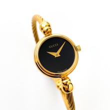 Load image into Gallery viewer, Vintage Ladies' Gold-Plated Gucci 2700.2.L Bangle Quartz Watch with Black Dial