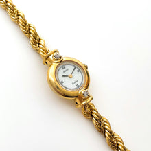 Load image into Gallery viewer, Very Rare 90s Gold-Plated Seiko Exceline Jewellery Quartz Watch with Tiny Mother of Pearl Dial, Thin Bracelet and Diamonds