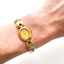 Load image into Gallery viewer, Tiny Vintage 1990s Gold-Plated Ladies' Seiko Quartz Watch With Intricate Bracelet and Oval Dial