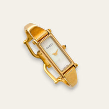 Load image into Gallery viewer, Vintage 1990s Ladies' Gold-Plated Gucci 1500L Bangle Quartz Watch - Mother of Pearl Dial