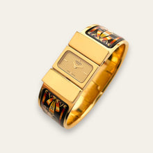 Load image into Gallery viewer, Vintage Hermès Loquet - 1990s Enamel Bangle Horse Motif Quartz Watch