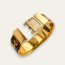 Load image into Gallery viewer, Vintage Hermès Loquet - 1990s Enamel Bangle Horse Motif Quartz Watch
