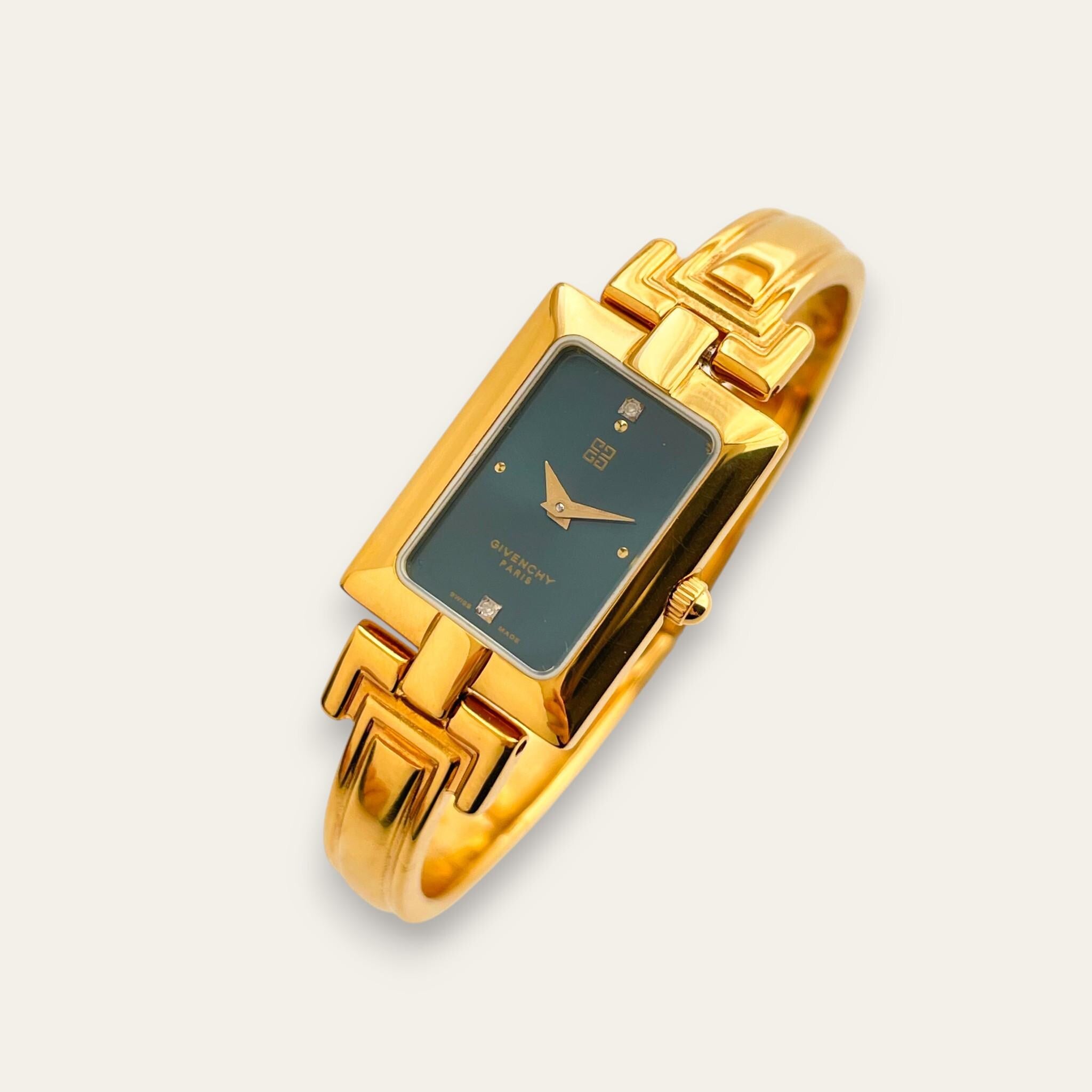 ジバンシイ GIVENCHY シェル文字盤 バングルウォッチ 腕時計 H358 ジバンシイ GIVENCHY シェル文字盤 バングルウォッチ 腕時計 H358
