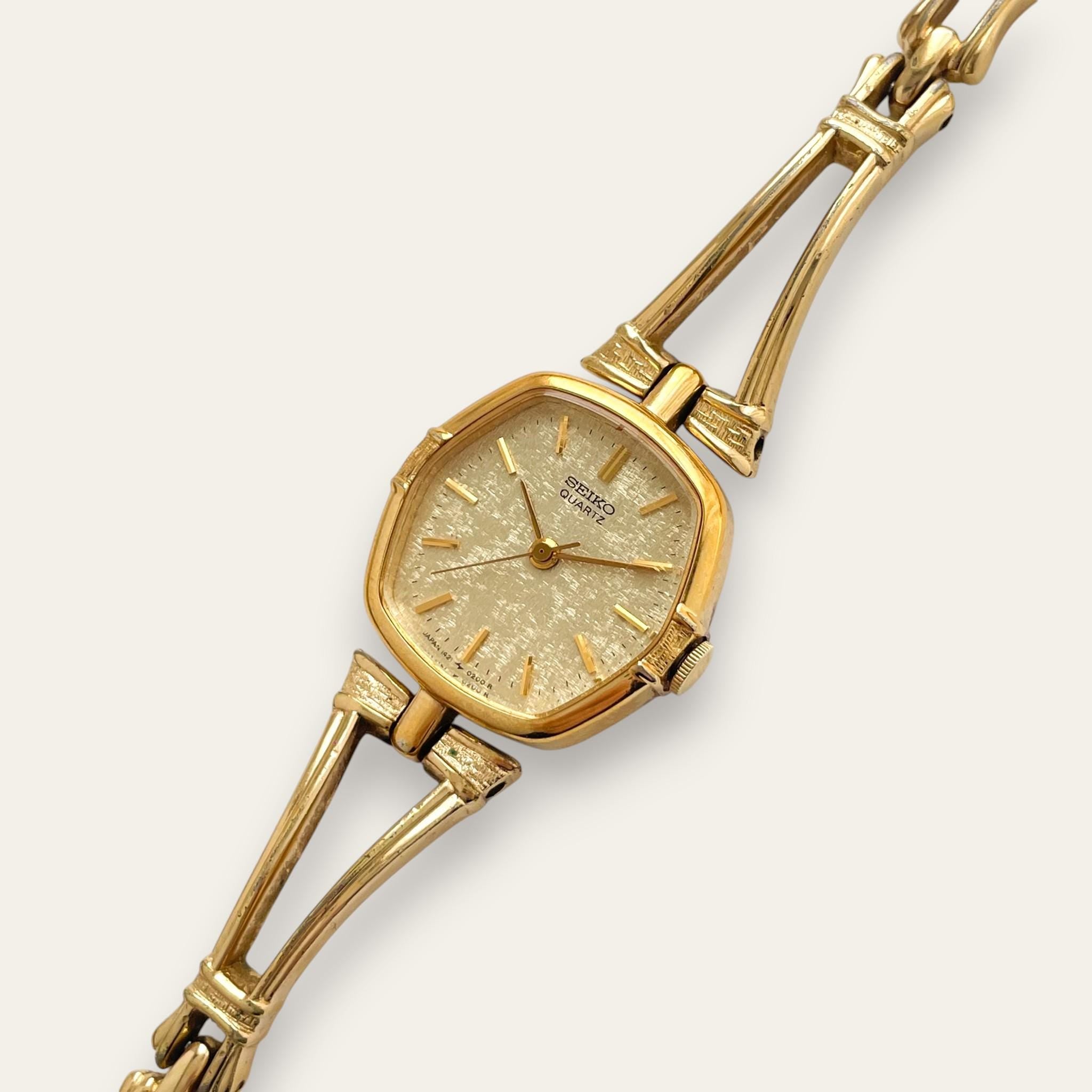 Vintage Seiko Gold Sculptural Dress Watch - Textured Linen Dial Finchley Watches Vintage Seiko Gold Sculptural Dress Watch - Textured Linen Dial Finchley Watches
