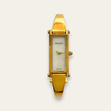 Load image into Gallery viewer, Vintage Gucci 1500L Gold Bangle Watch with Mother of Pearl Dial, 90s Quartz